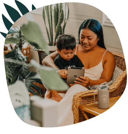 Mother and son using a tablet device